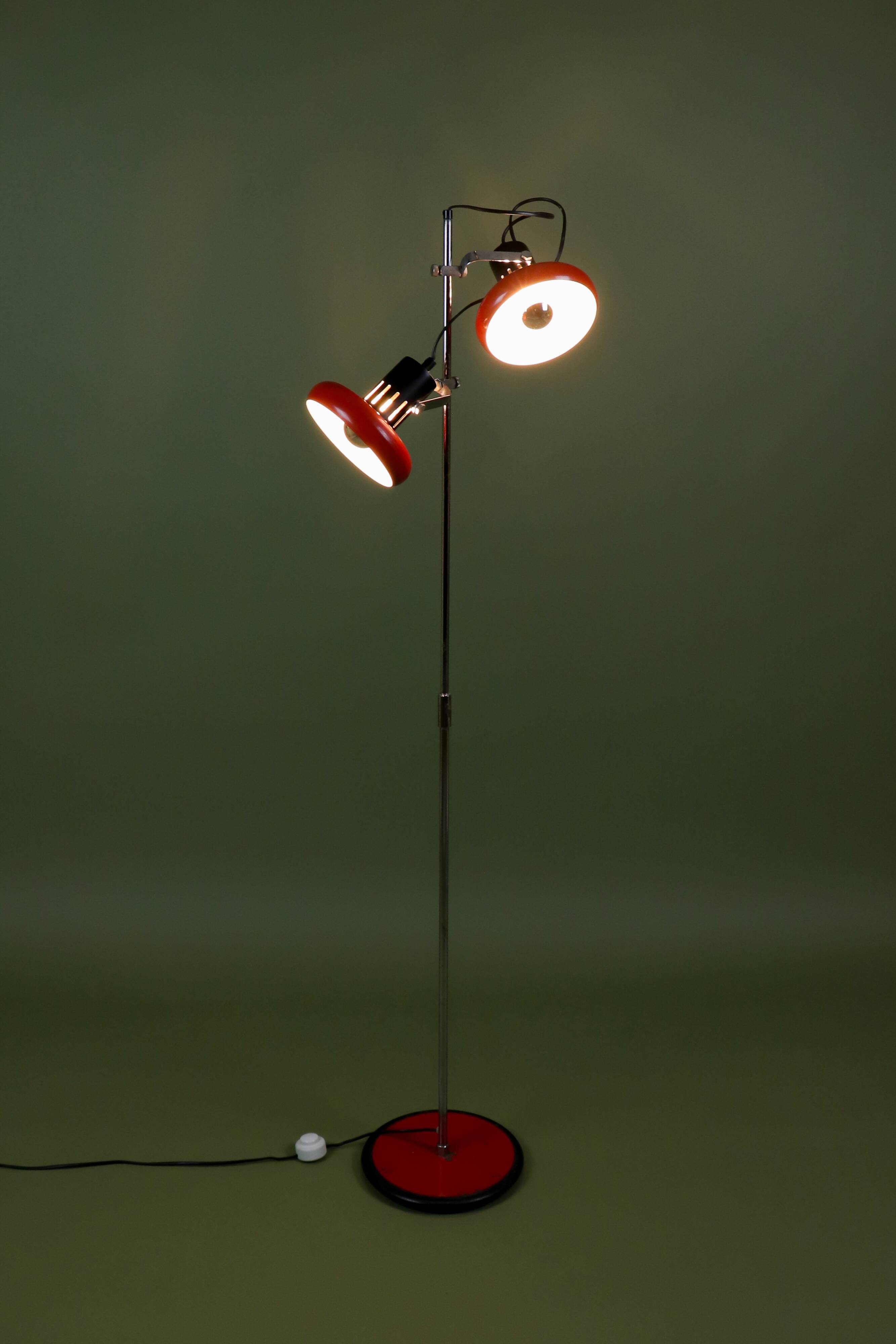 Red and black Aluminor floor lamp with two lights from the 1960s.