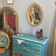 Miroir oval en bois doré 70x49cm