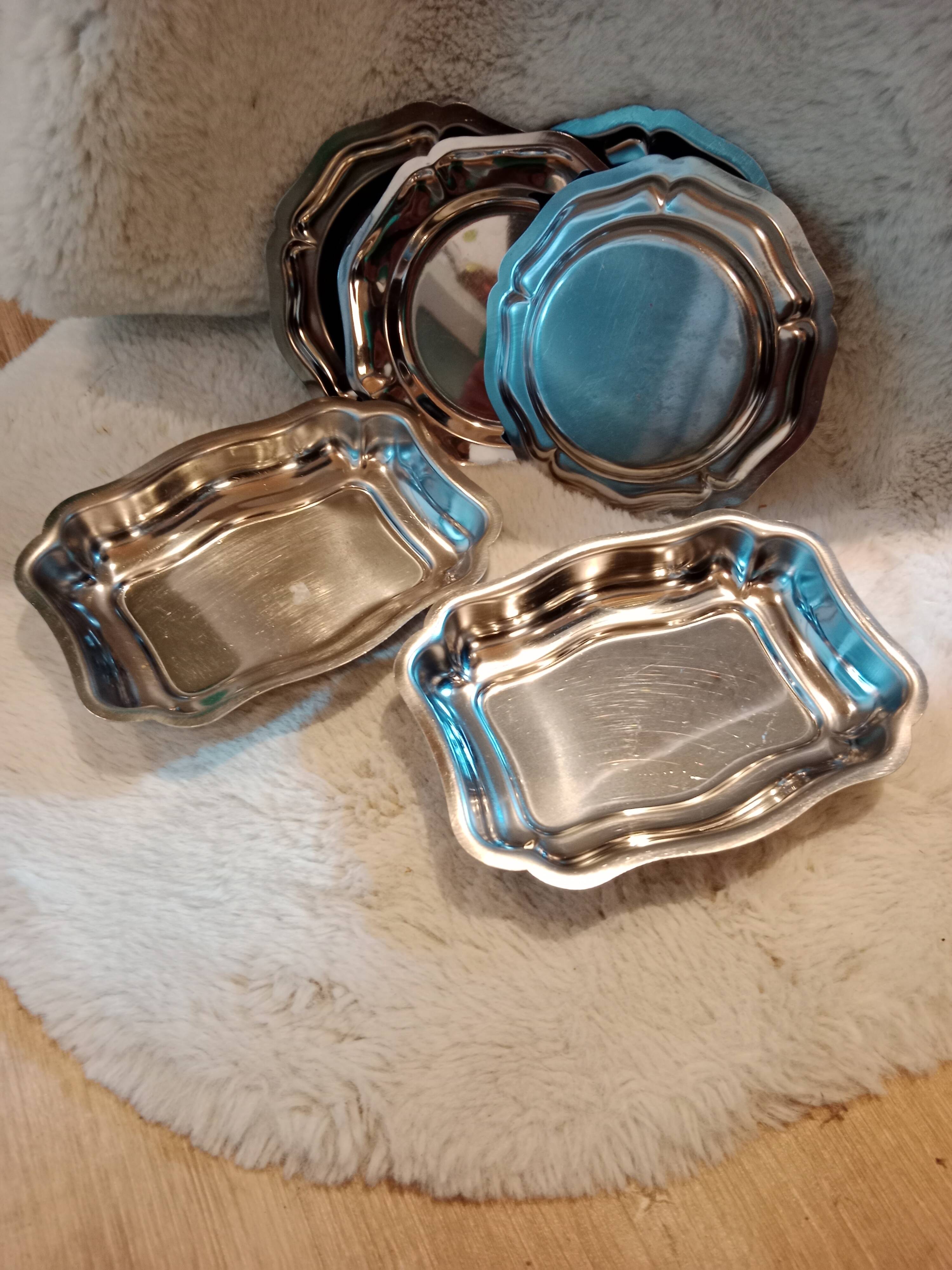 Set of vintage stainless steel mini dishes.