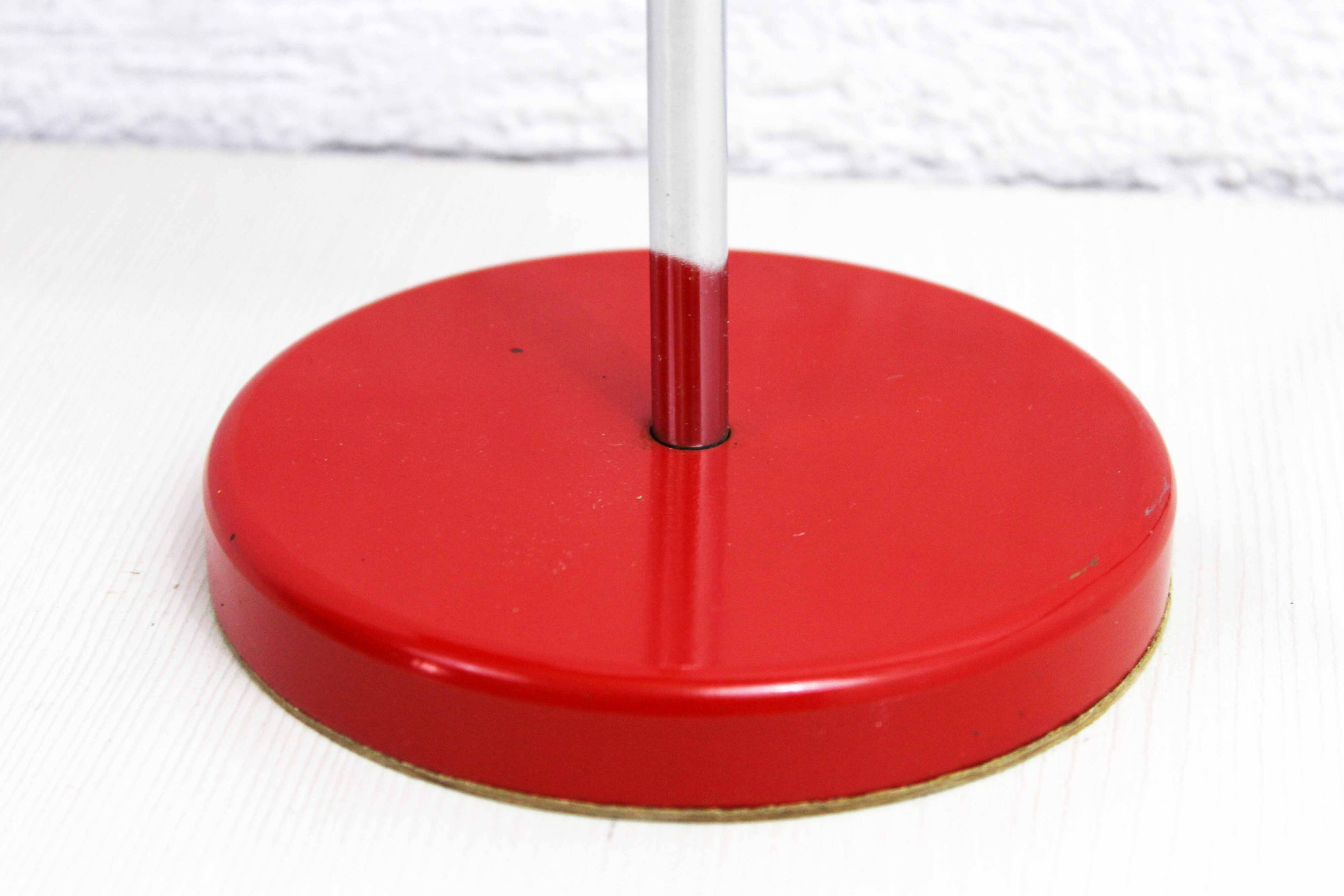 Red metal articulated desk lamp