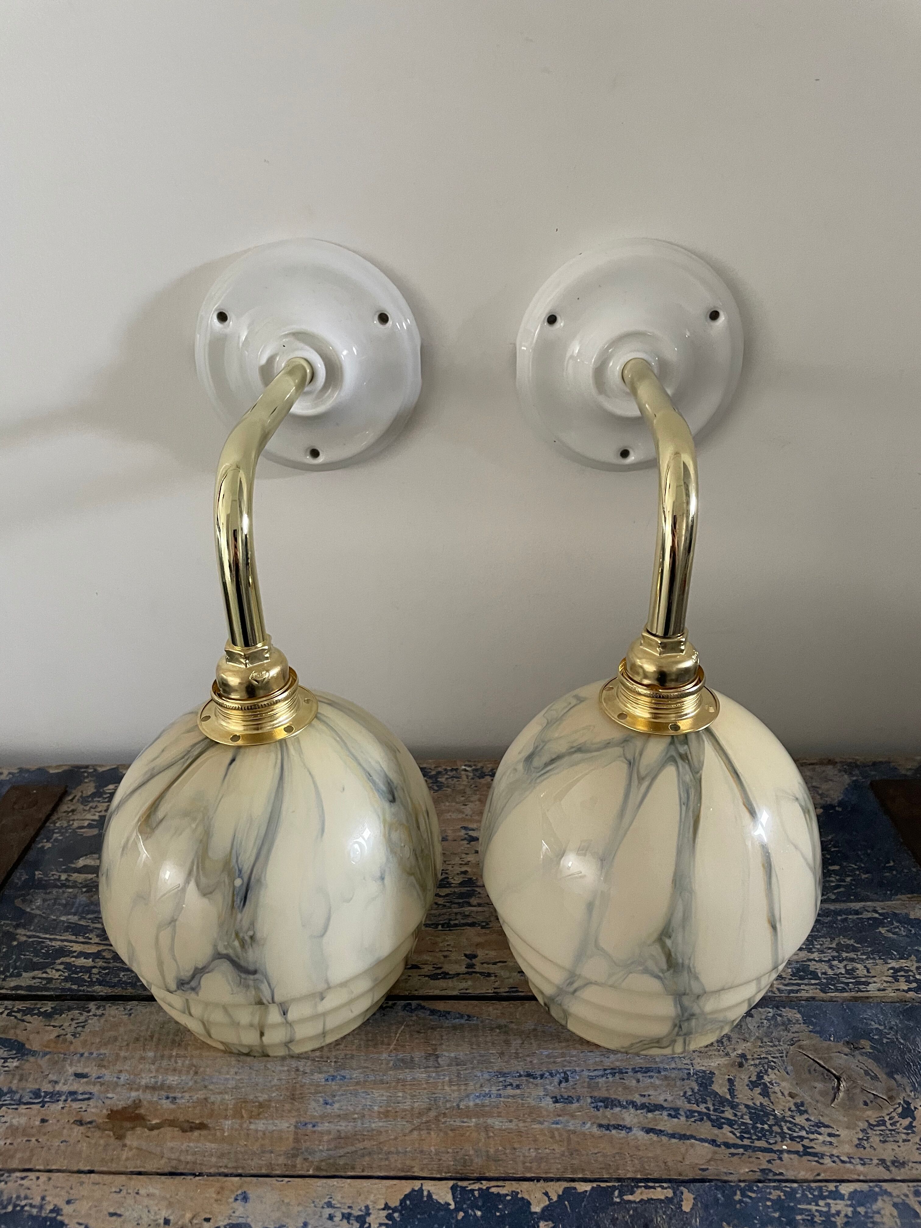 Pair of art deco wall lamps in marbled opaline
