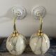 Pair of art deco wall lamps in marbled opaline