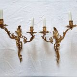 Pair of vintage French wall sconces in bronze, Louis XV Rococo style.