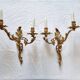Pair of vintage French wall sconces in bronze, Louis XV Rococo style.
