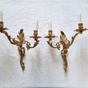 Pair of vintage French wall sconces in bronze, Louis XV Rococo style.