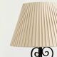 Vintage wrought iron table lamp in swirl shape with pleated shade