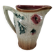 Moulded slip pitcher - late 19th century - Floral decoration in relief