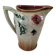 Moulded slip pitcher - late 19th century - Floral decoration in relief