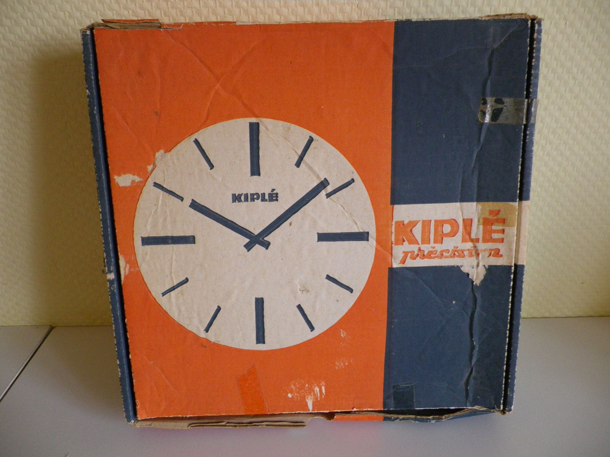Clock in mahogany formica, metal, wood, glass, in its original box - Brand KIPLE - 70s