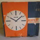 Horloge en formica acajou métal bois verre dans sa boite d'origine - Marque KIPLE - Années 70