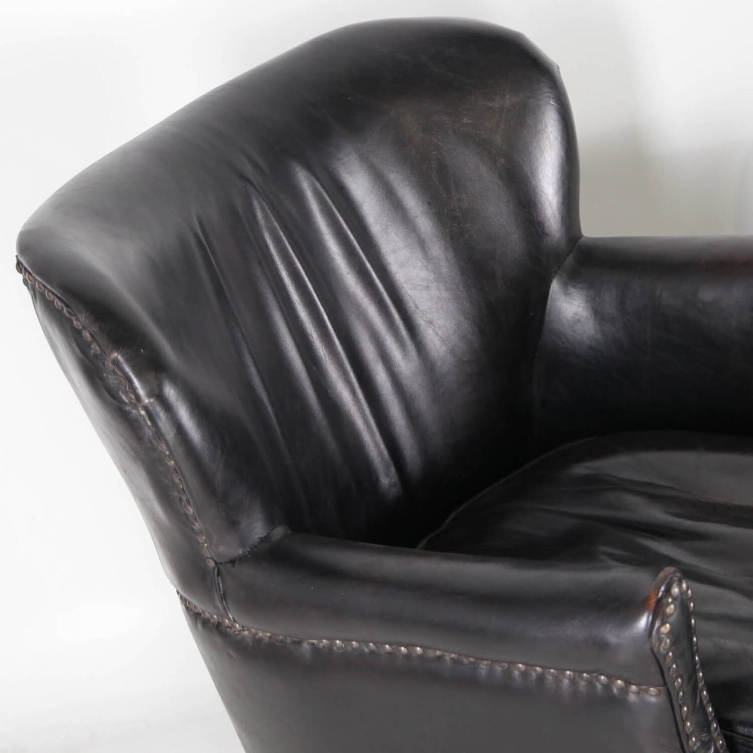 Pair of small leather club armchairs
