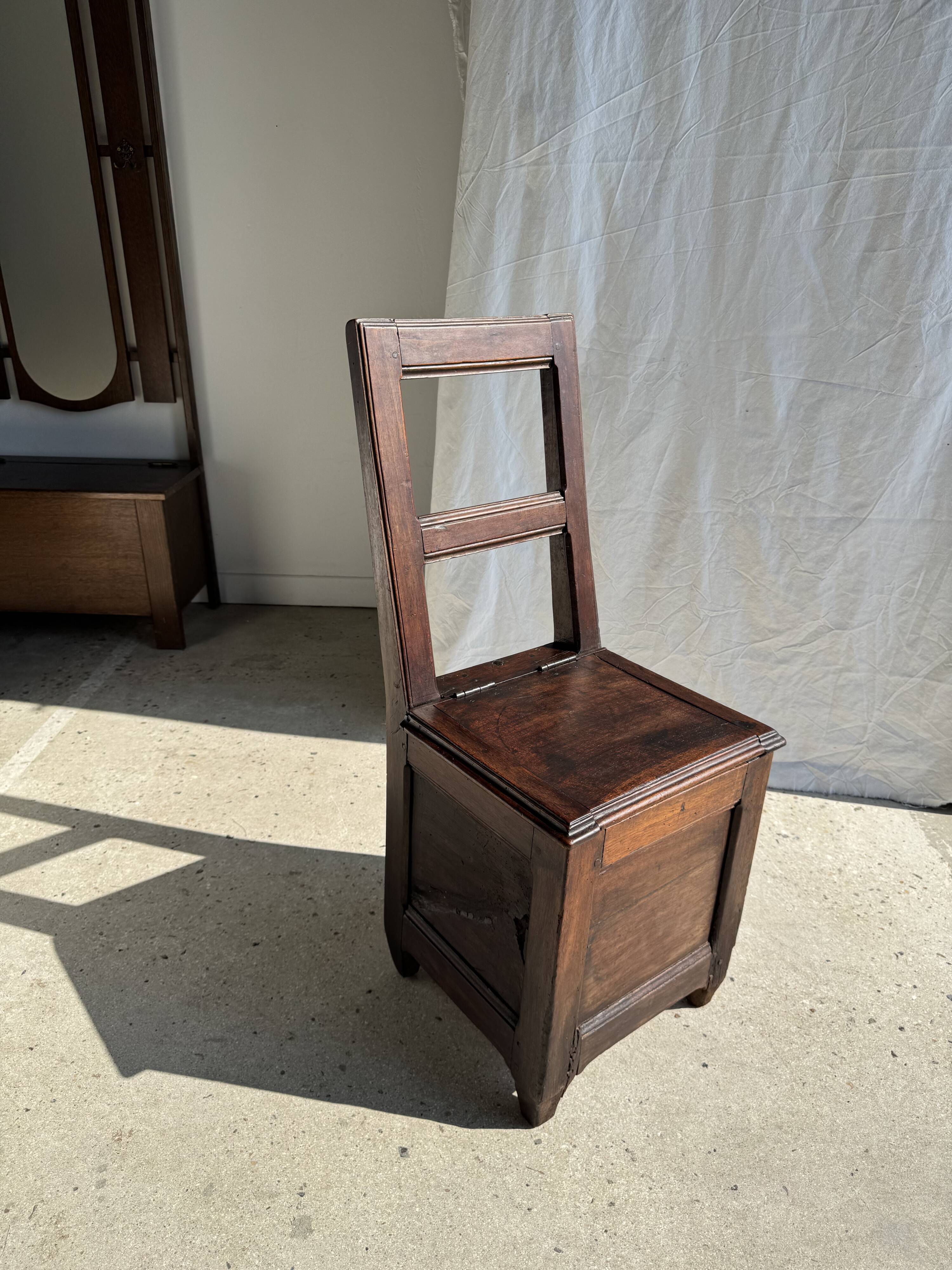 Antique oak storage chair