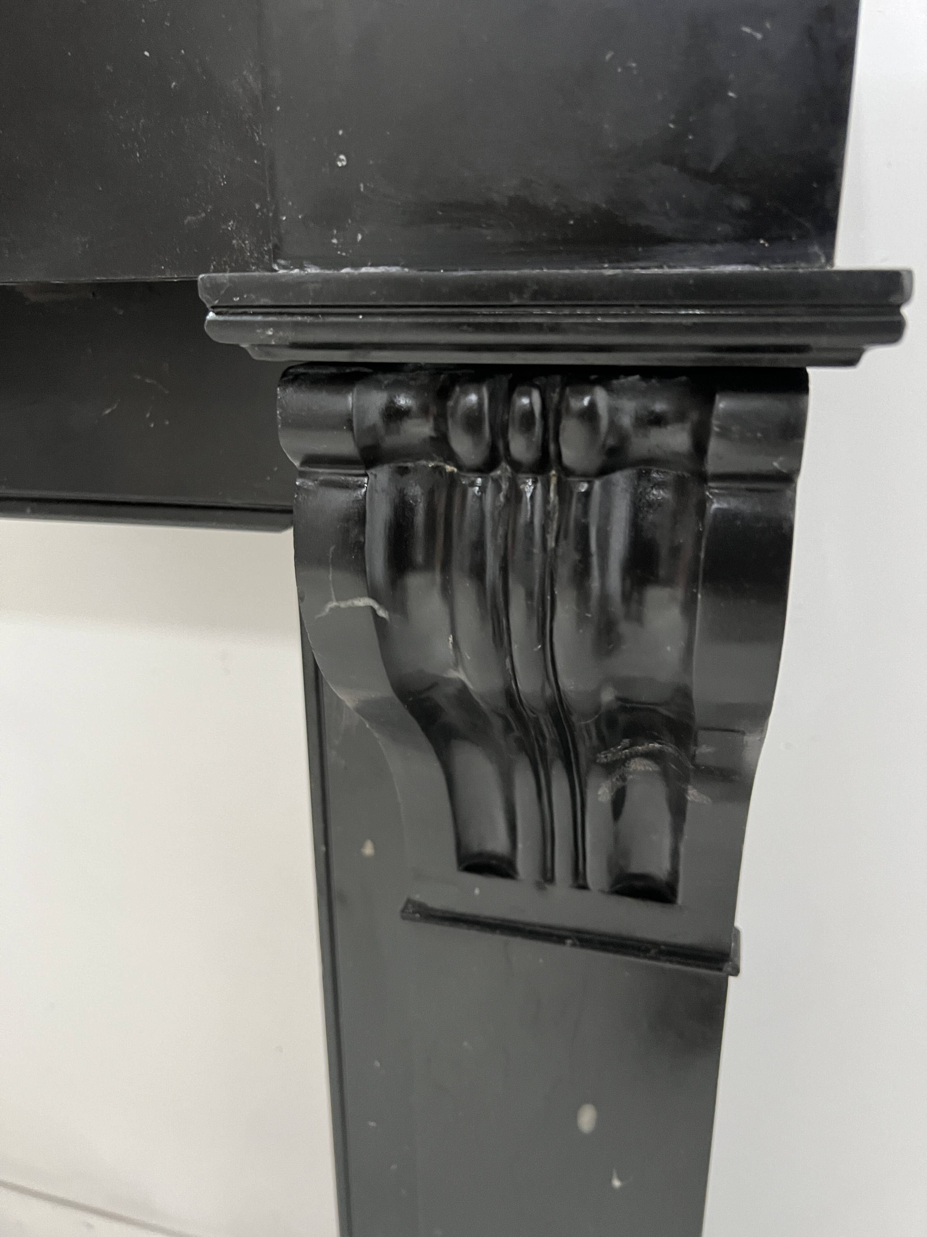 Napoleon III fireplace with a black marble corbel, 19th century.