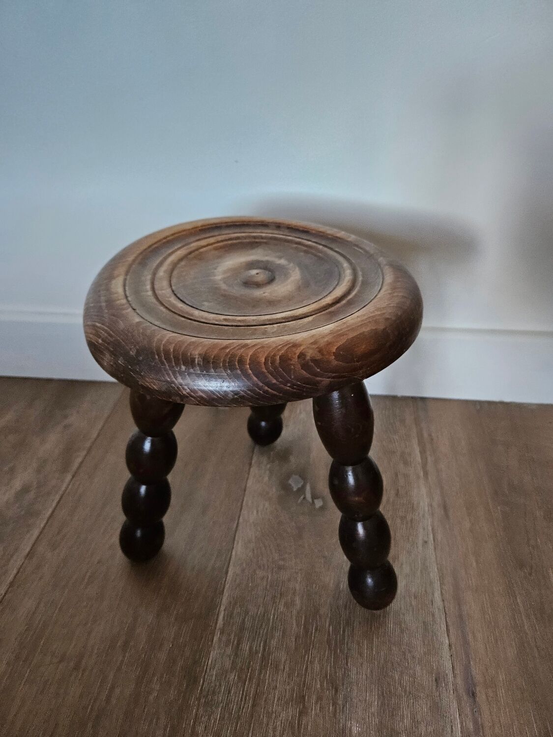 Wooden tripod stool