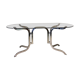 Table à manger design année 70 en chrome et verre fumé