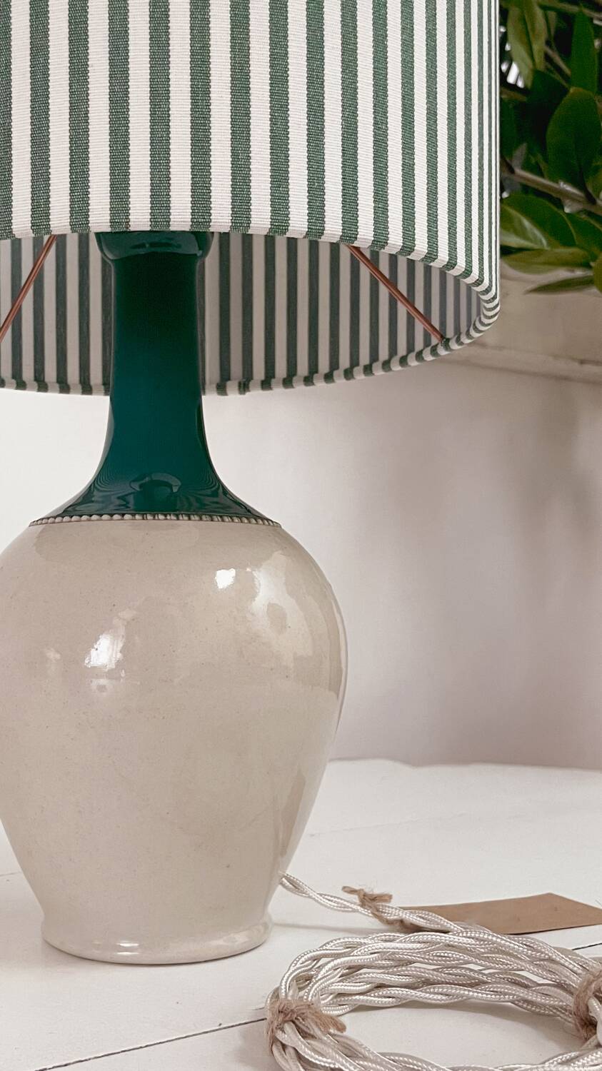 Sandstone lamp and striped lampshade