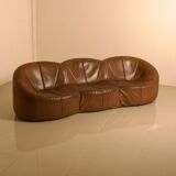 "Pumpkin" 3-seater canapé in patinated brown leather by Pierre Paulin for Arti.