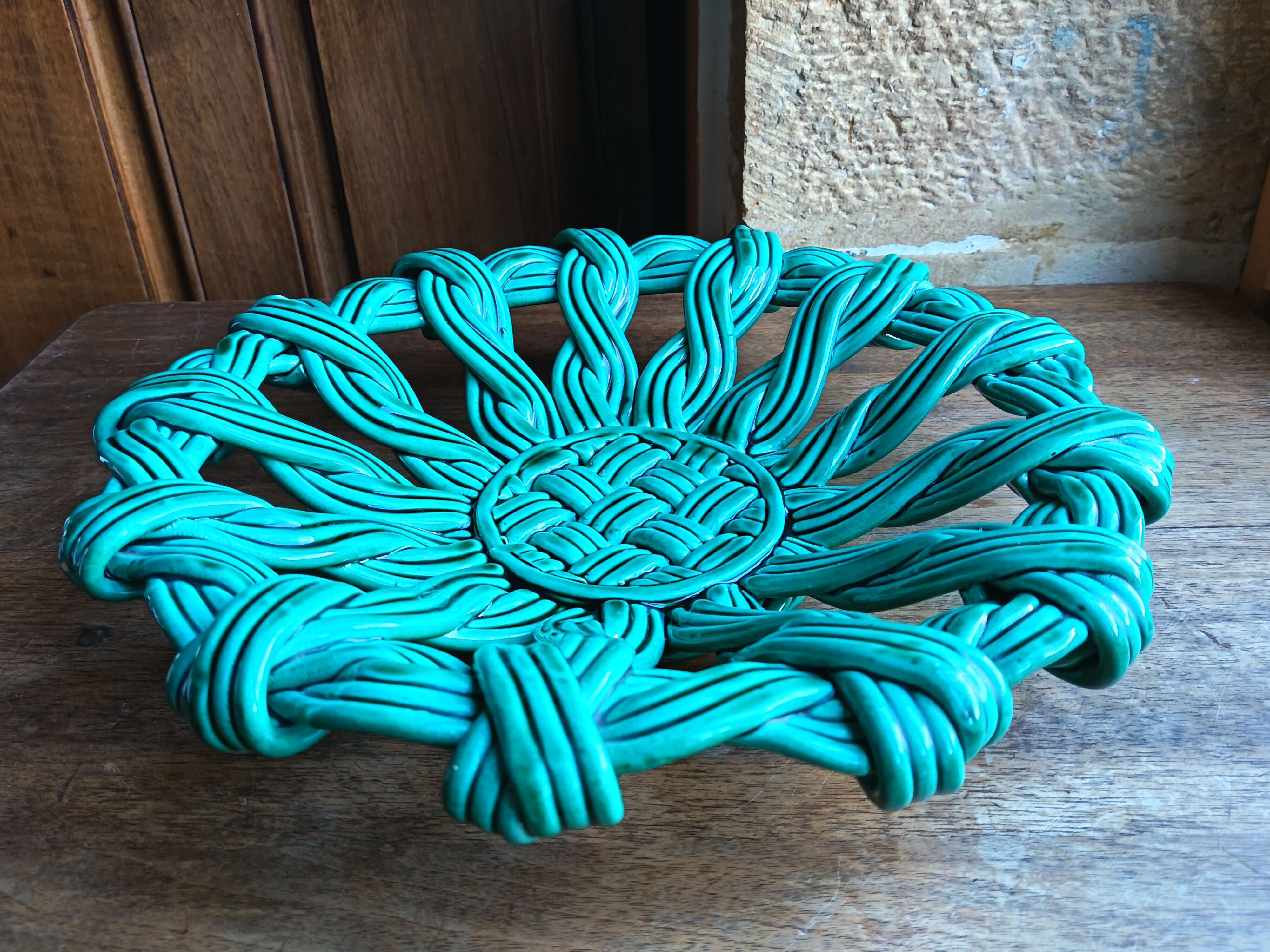Woven green ceramic basket