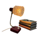 Vintage burgundy table lamp with glass shade.
