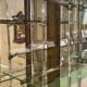 Early 20th-century shop display cabinet in oak with sliding doors.