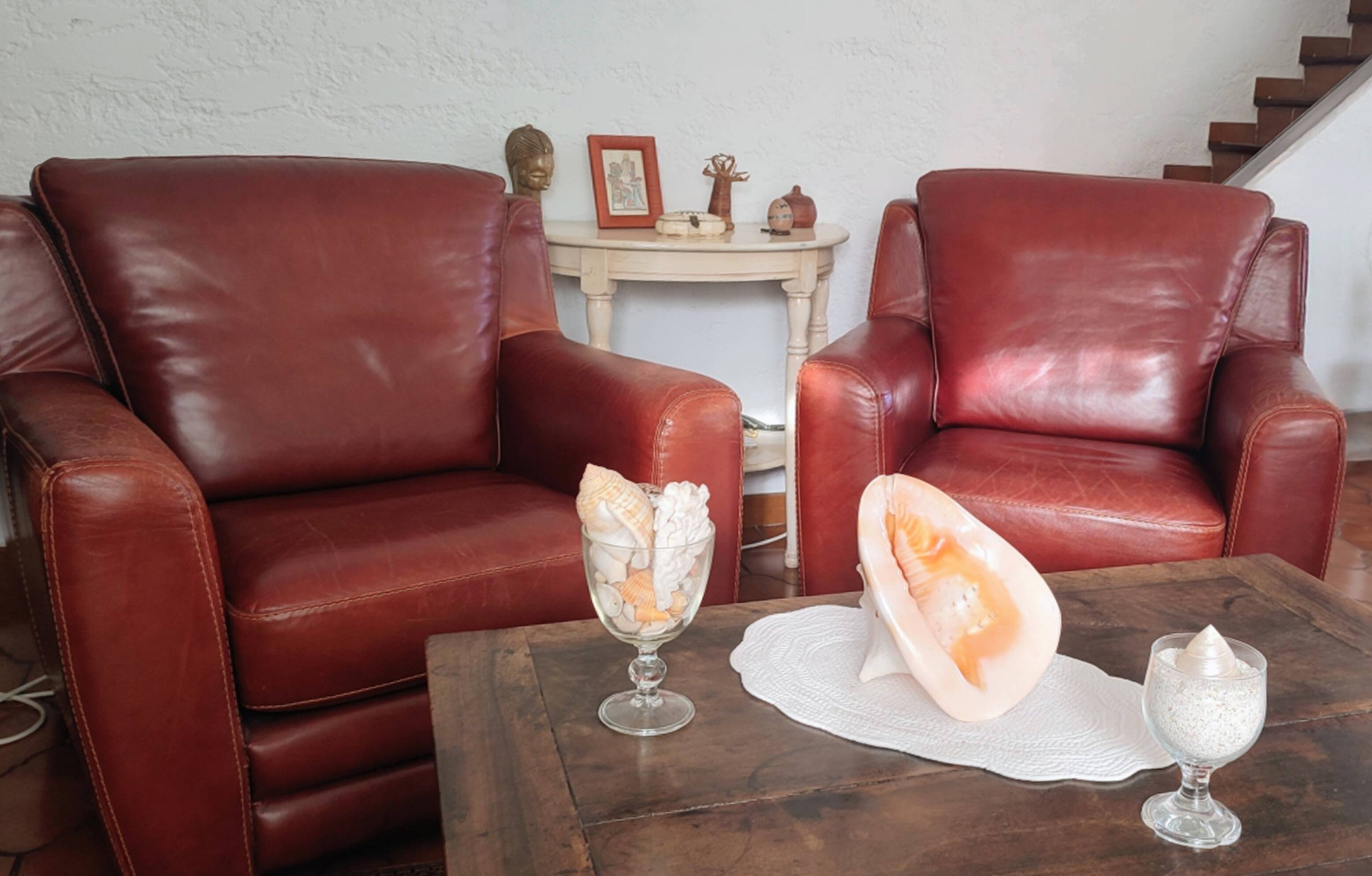 Genuine leather club chairs by Nicoletti, like new.
