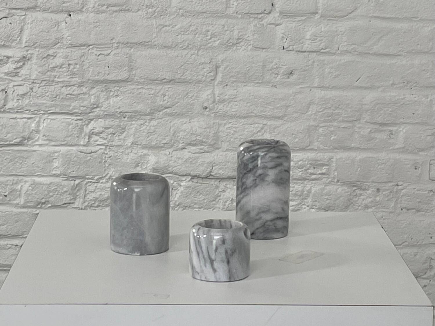 Pair of marble candlesticks