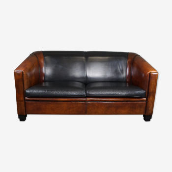 2.5-seater art deco style sofa in sheepskin