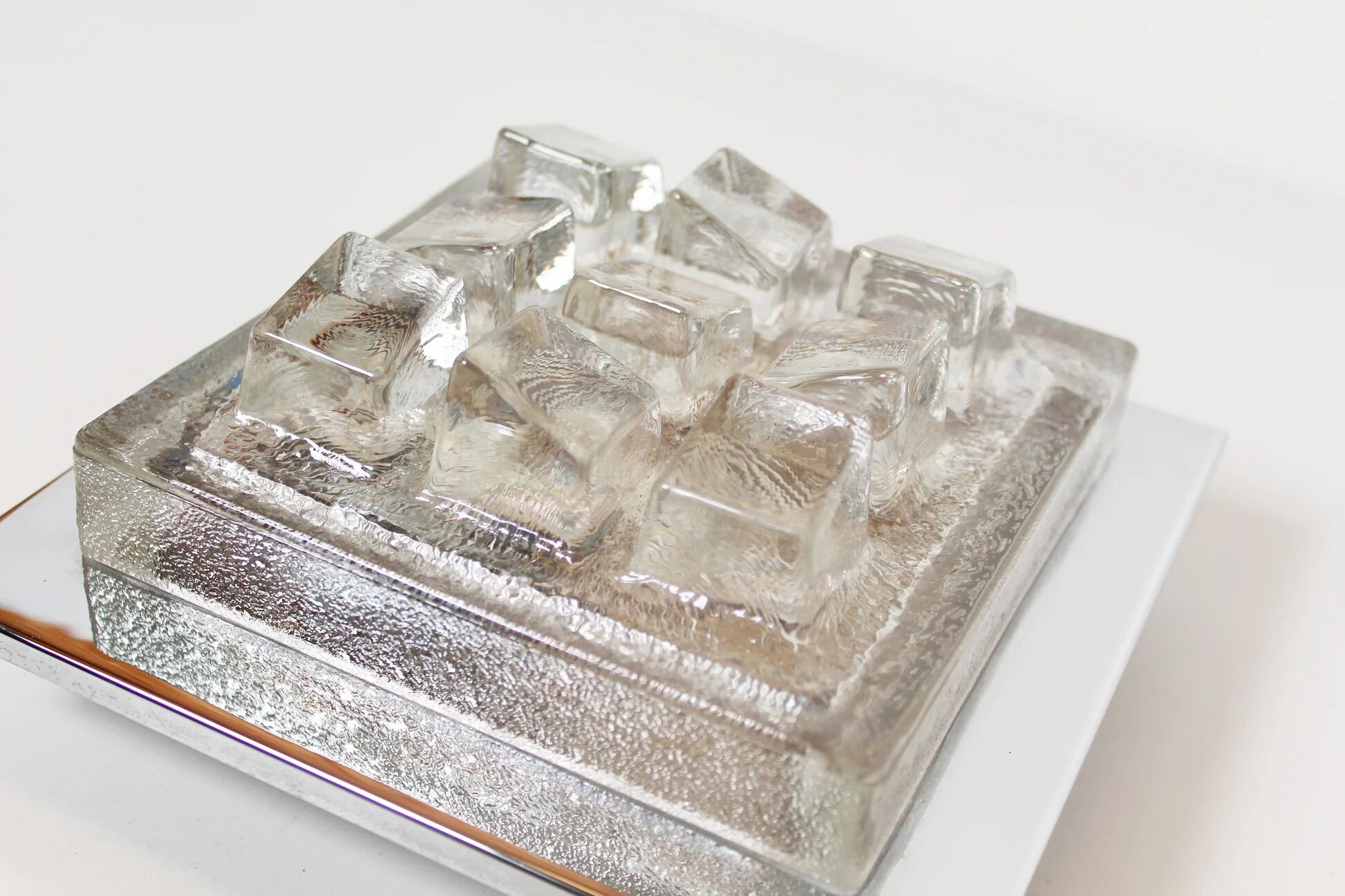 Single 1970s brutalist glass wall sconce by Hillebrand