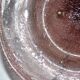 Antique plate in pink bubbled blown glass