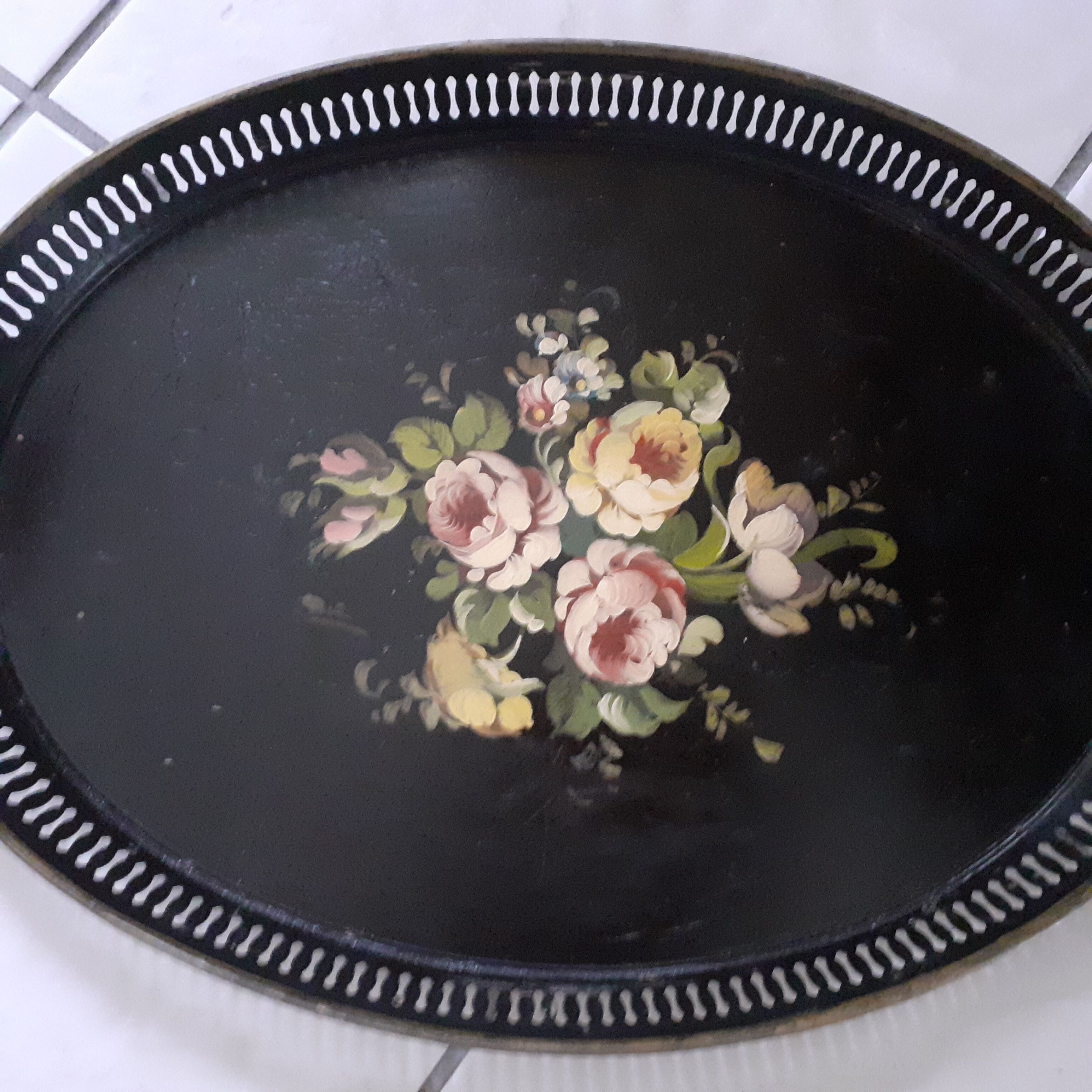 Old black oval top. Bouquet of roses. Hand painted.