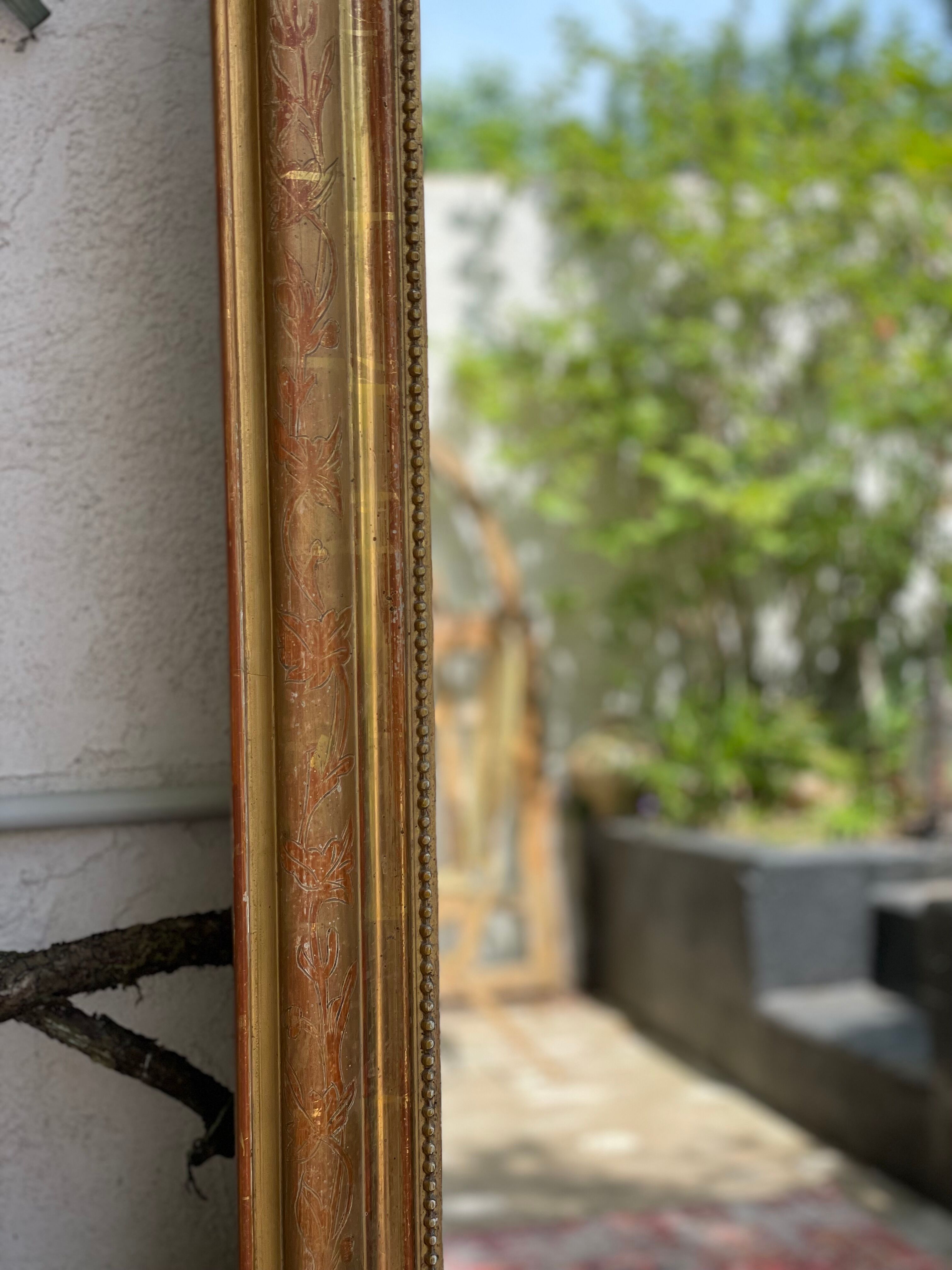 Antique mirror gilded with gold leaf (153x83)
