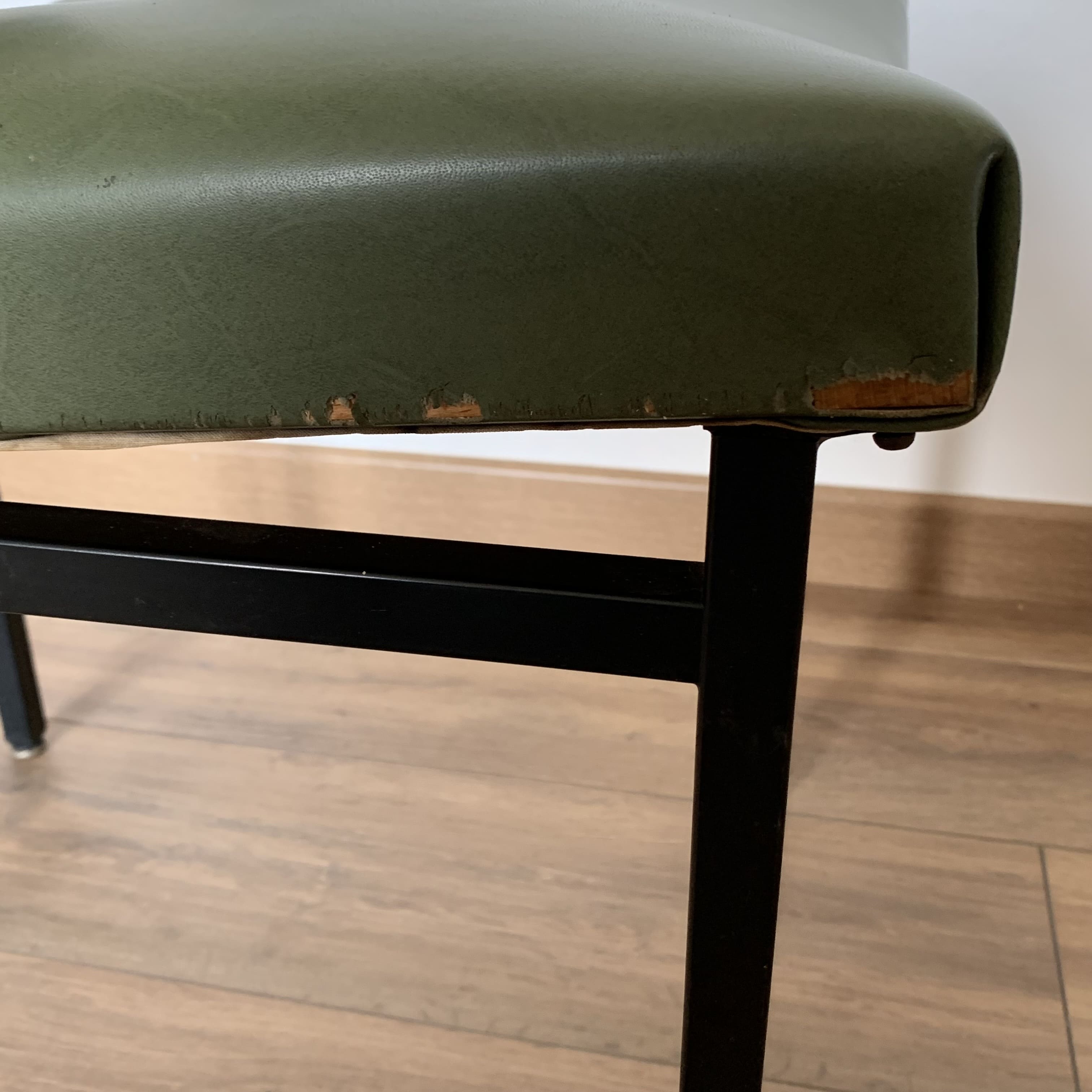 green and metal skai chair