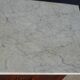 Antique mahogany chest of drawers with white marble.