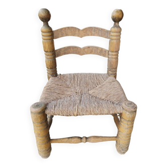 Chaise basse paillée style Charles Dudouyt