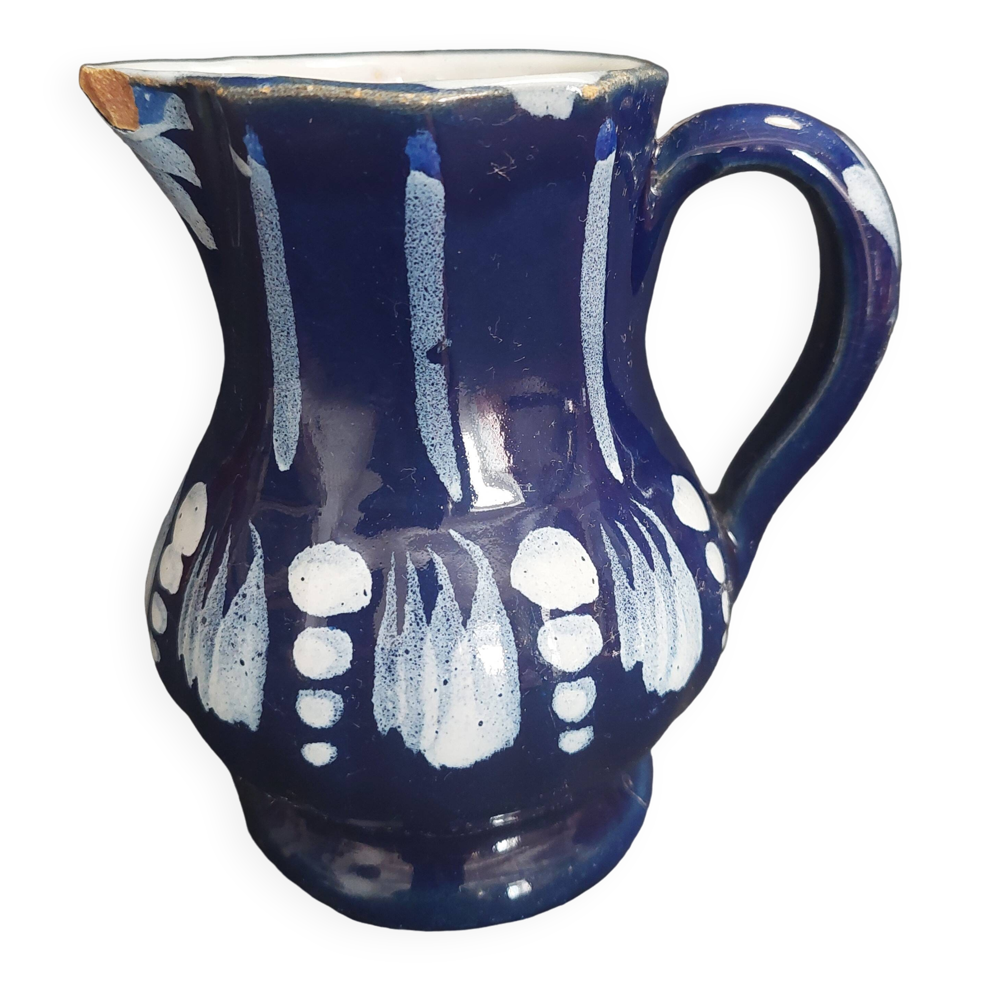 Earthenware pitcher from the North of France with blue covering, 19th century