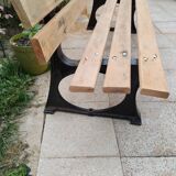 Garden bench with old cast iron legs