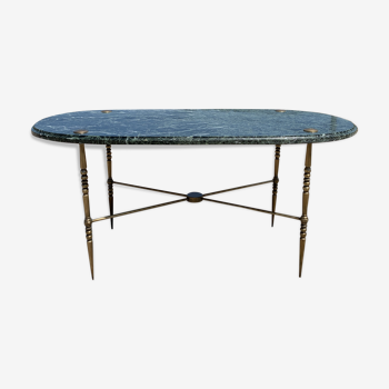 Oval coffee table in veined green marble