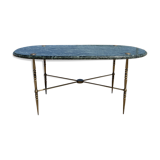 Oval coffee table in veined green marble