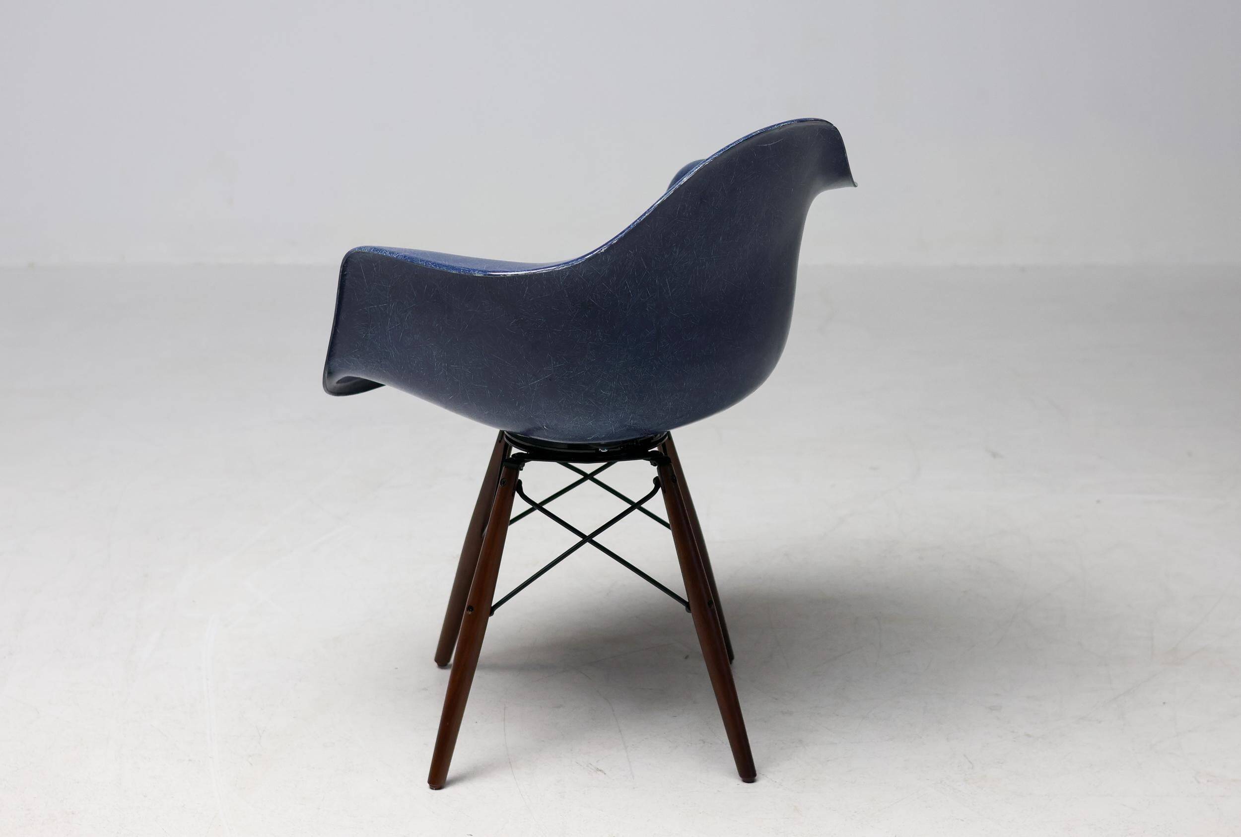 Indigo blue Charles Eames "PAW" armchair by Herman Miller, mid-century modern.