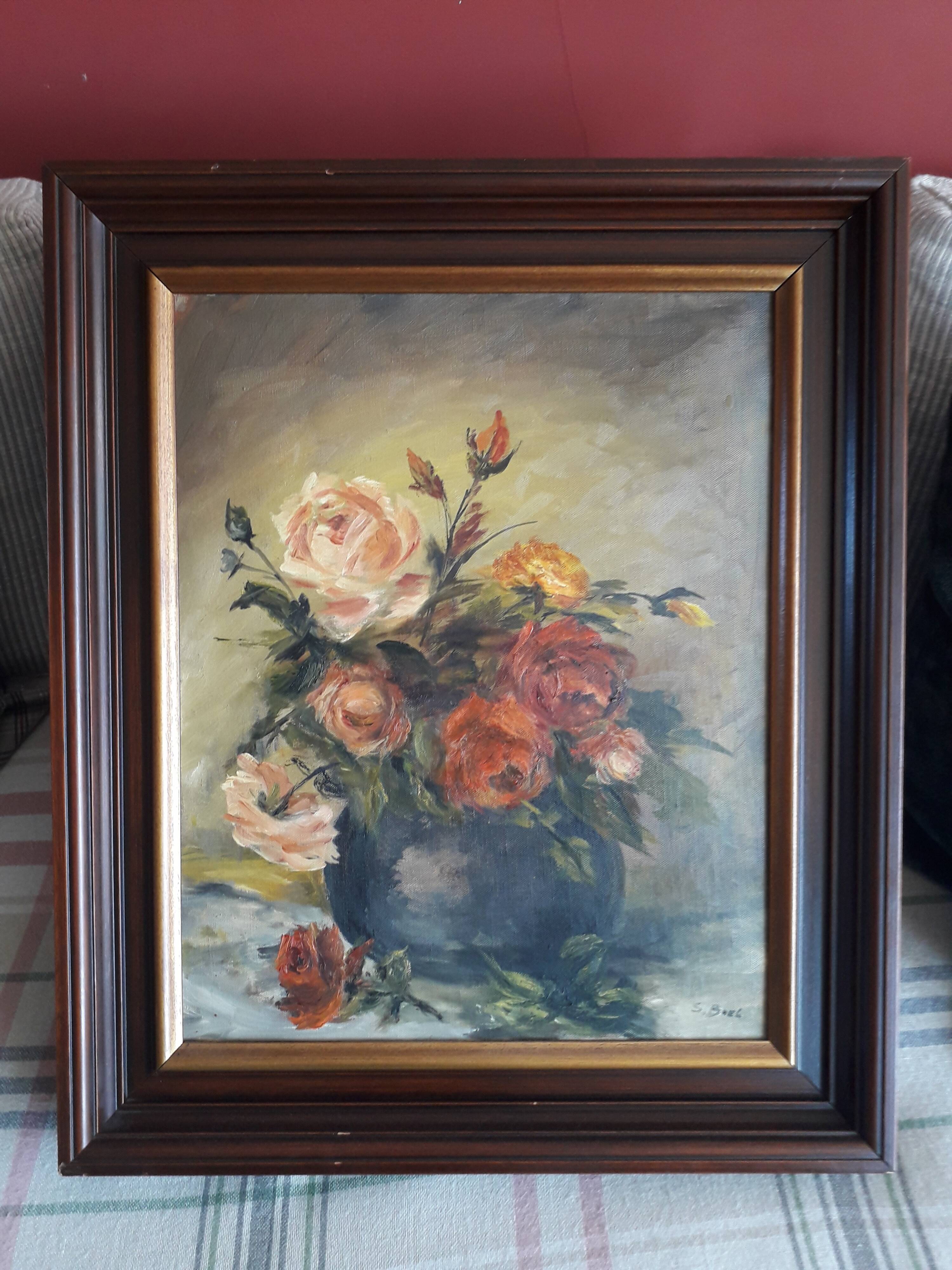 Antique oil painting depicting a bouquet of roses