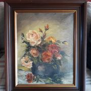 Antique oil painting depicting a bouquet of roses
