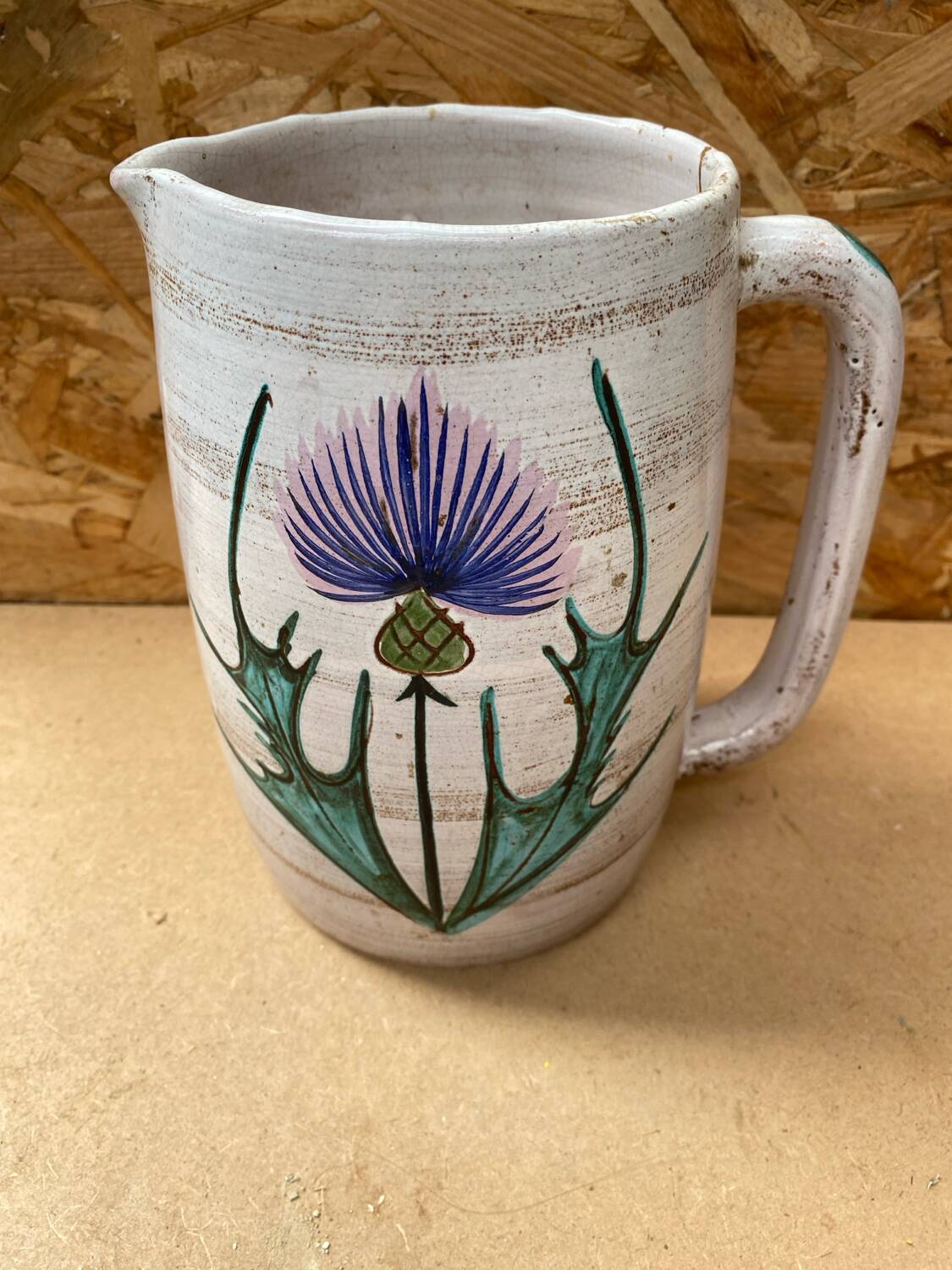 Antique vallauris ceramic pitcher with vintage blue thistle decor