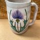 Antique vallauris ceramic pitcher with vintage blue thistle decor