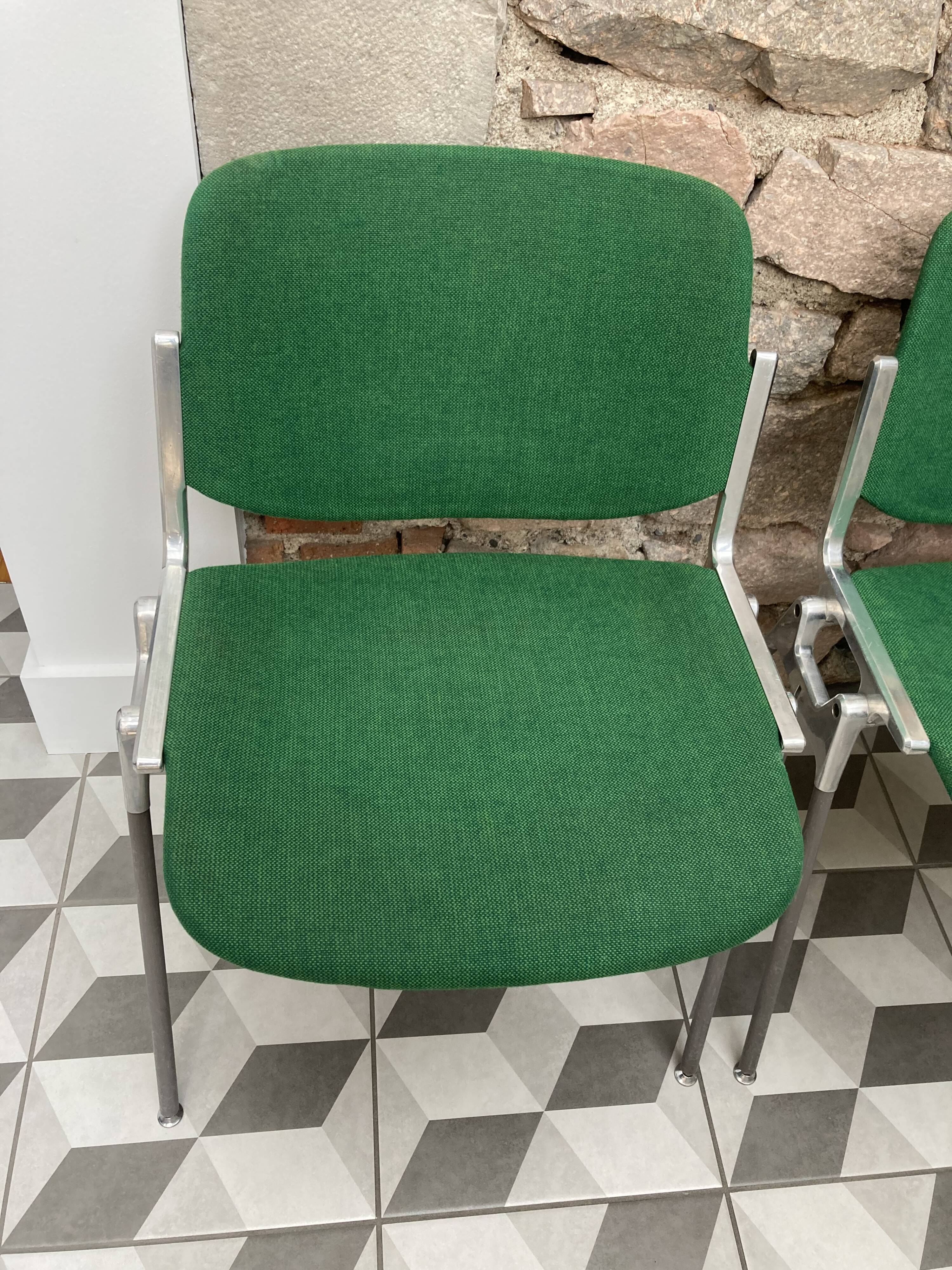 Pair of green DSC 106 chairs by Giancarlo Piretti