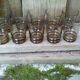 Set of 10 brown glasses and a carafe made in Belgium