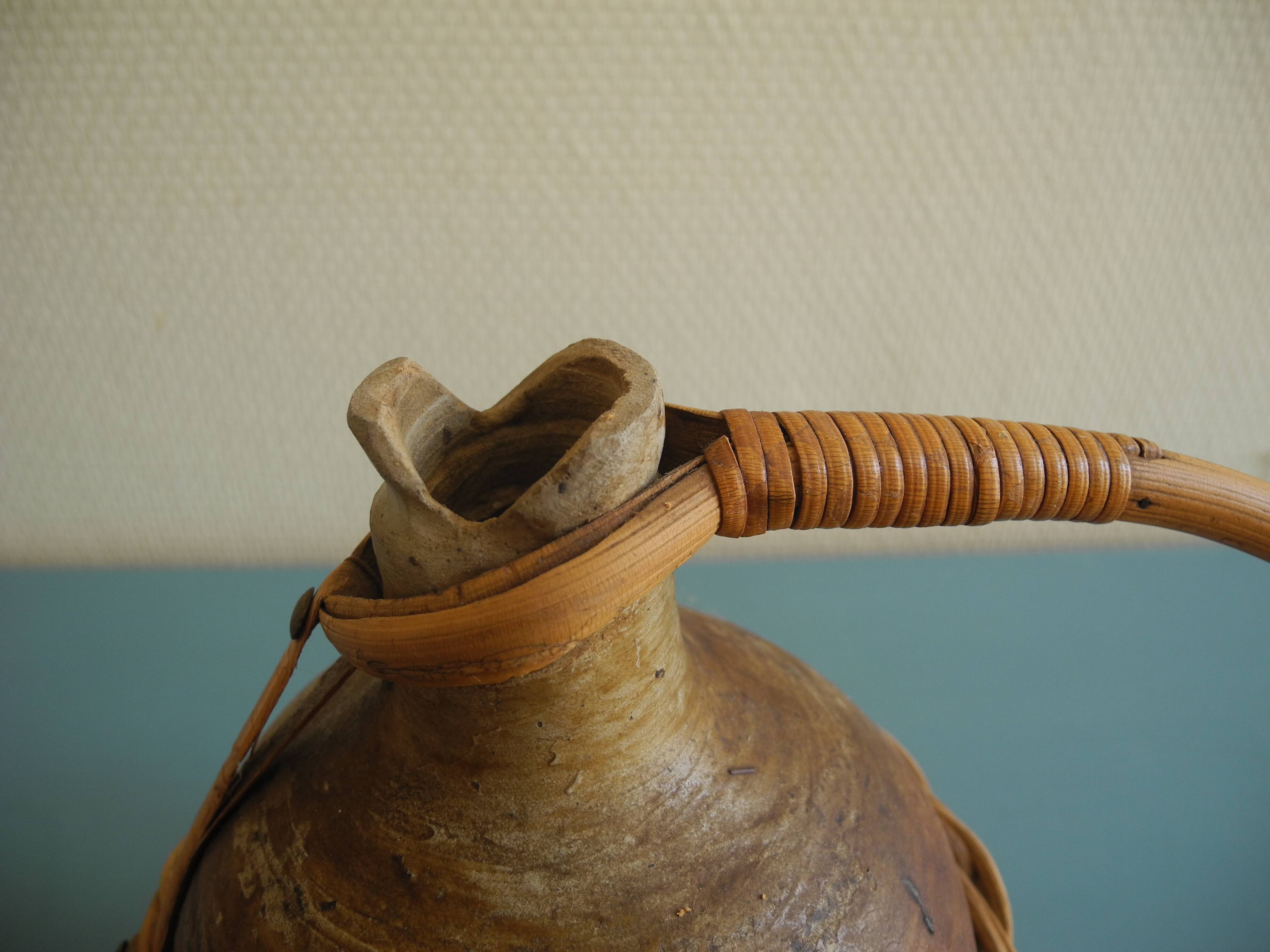 old stoneware bottle wicker vintage decoration stoneware bottle wicker