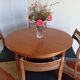 Scandinavian round extendable teak table