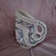 Zoomorphic pitcher in enamelled terracotta