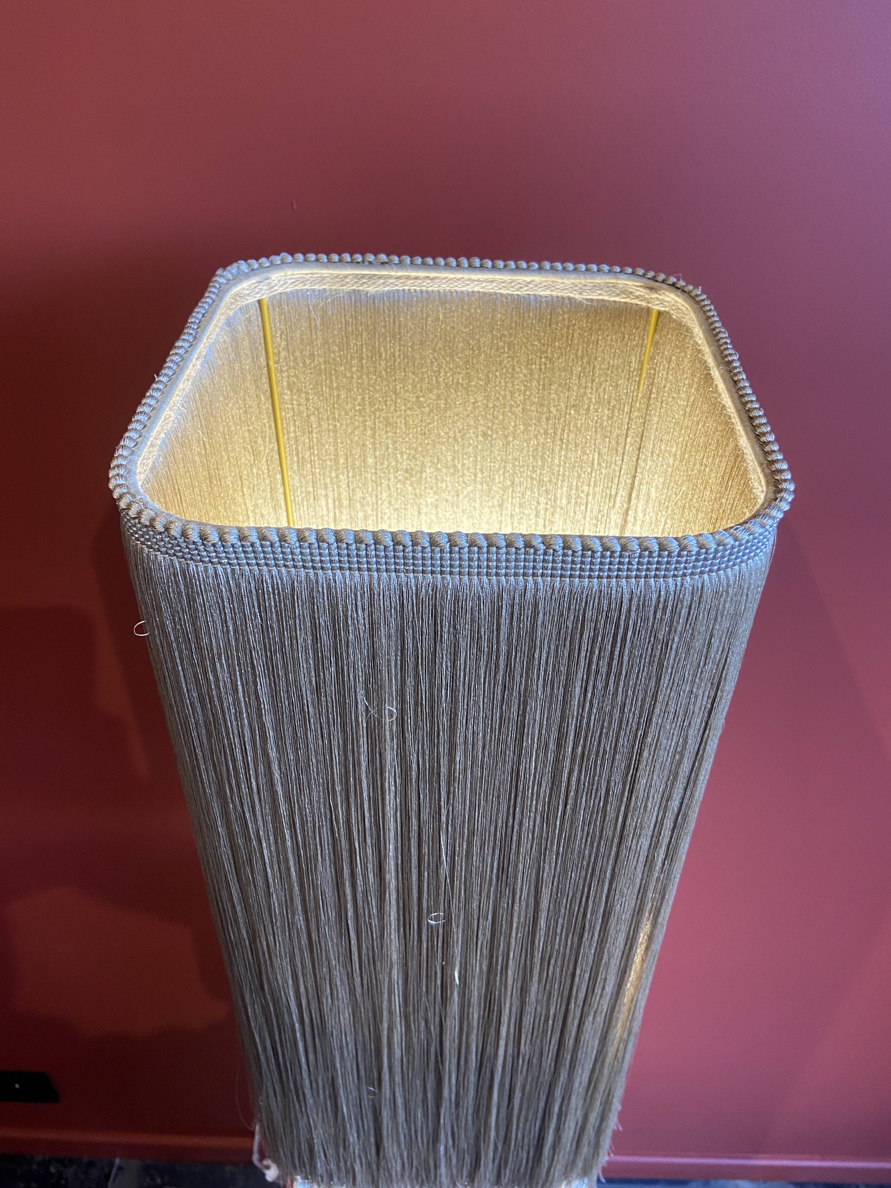 Base stuck blue beige marble-plaster, fringed lampshade Houles, 21st century.