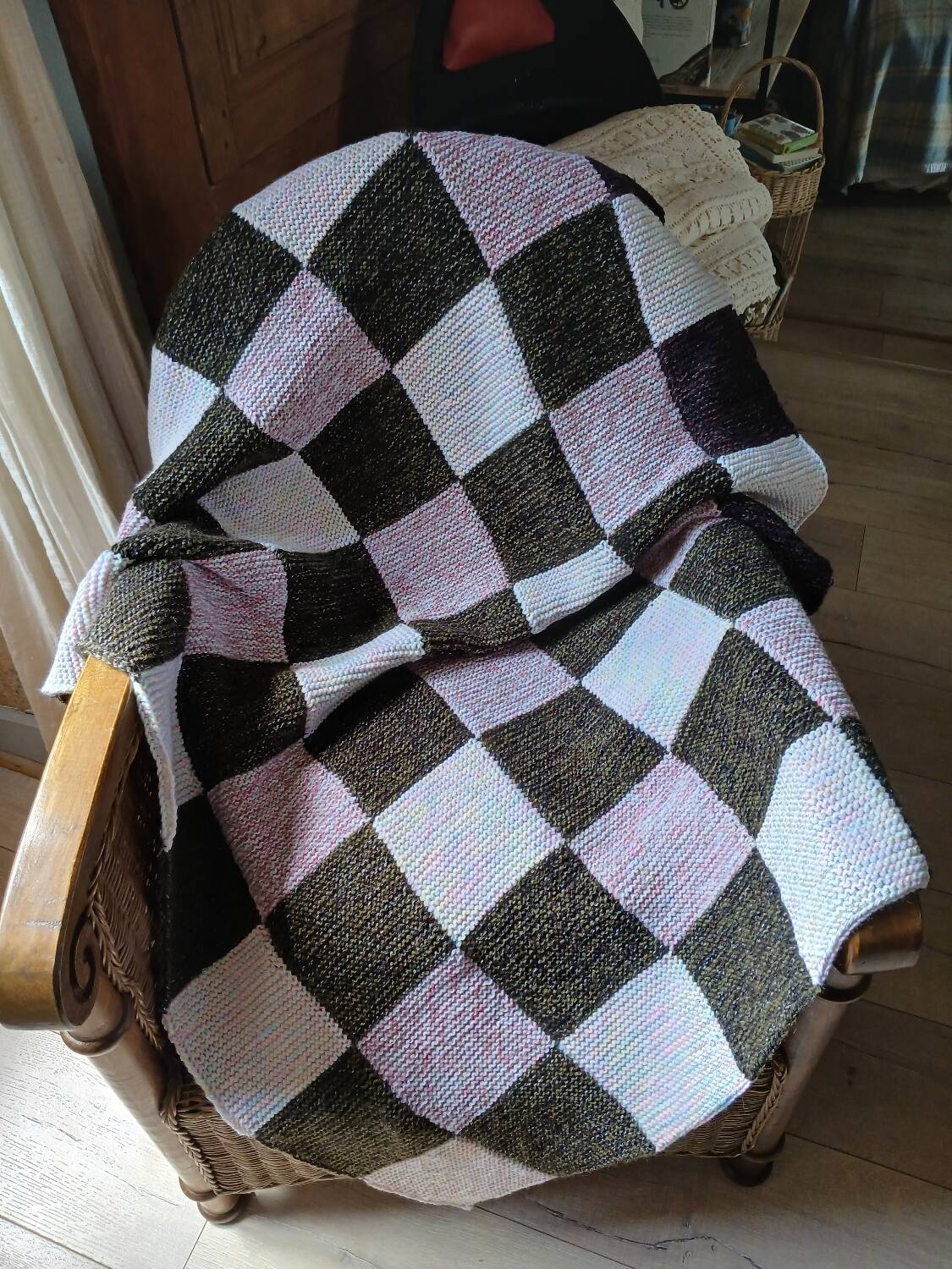 Hand-knitted patchwork plaid